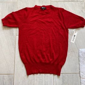 Red.  Short sleeved sweater.